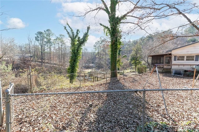 view of yard featuring a sunroom