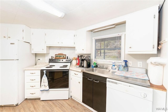 kitchen with white cabinetry, sink, white appliances, and light wood-type flooring