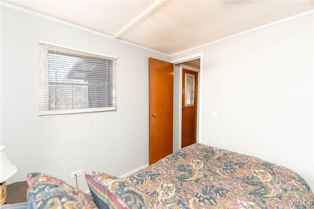 bedroom with ornamental molding