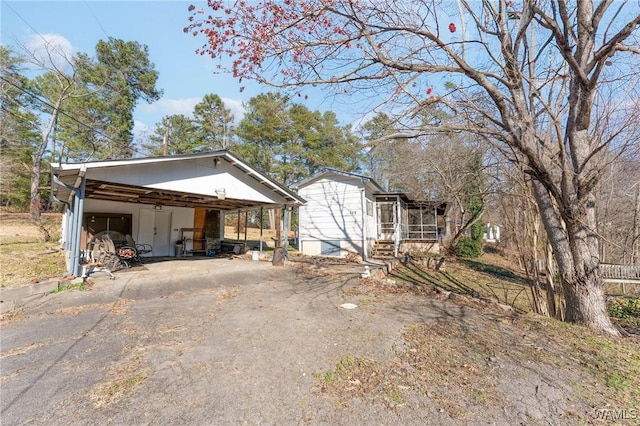 view of front of house featuring a carport