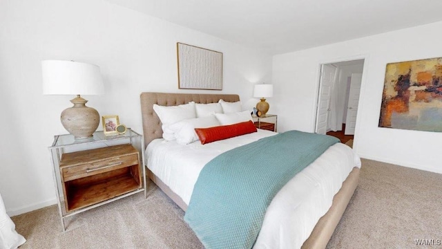 bedroom with light colored carpet