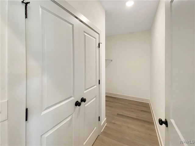 hallway featuring light wood-type flooring