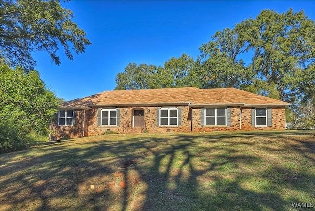 ranch-style home with a front yard