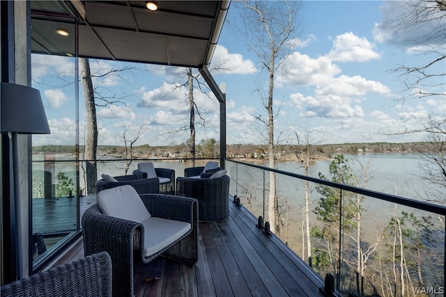 deck featuring a water view