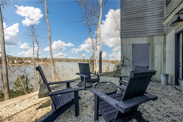 view of patio / terrace featuring a water view