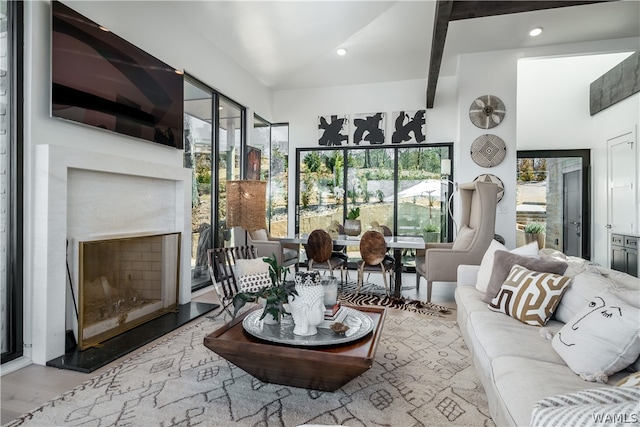 living room with a fireplace and light hardwood / wood-style floors