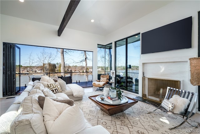 living room featuring beam ceiling