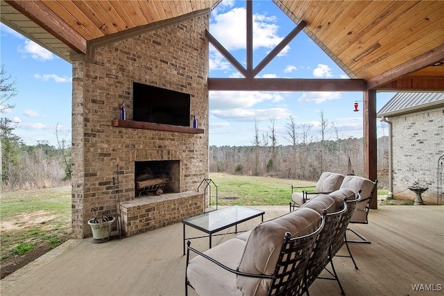 17505 Mormon Rd, Northport, AL 35475 - view of patio / terrace featuring an outdoor living space with a fireplace