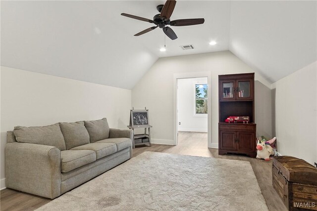 17505 Mormon Rd, Northport, AL 35475 - living area featuring vaulted ceiling, baseboards, a ceiling fan, recessed lighting, and wood finished floors