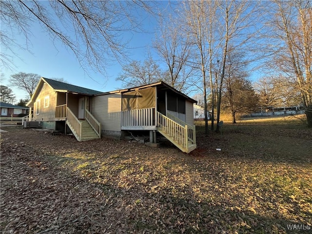 view of front of home featuring metal roof