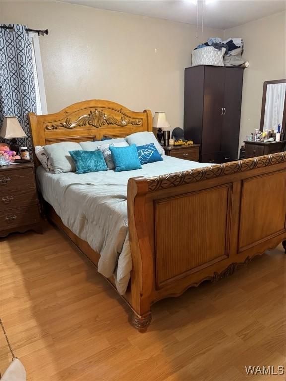 bedroom featuring light hardwood / wood-style floors