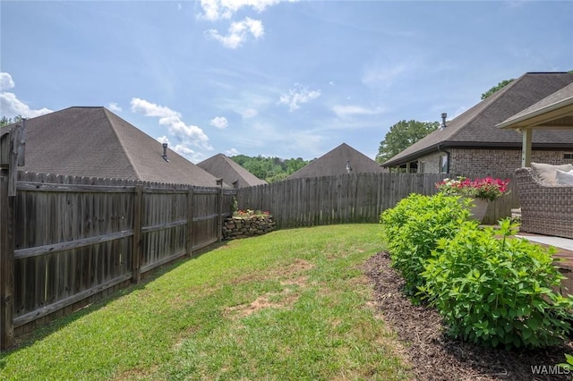 view of yard featuring a fenced backyard