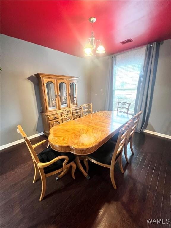 11627 Andrew Way, Tuscaloosa, AL 35405 - dining room with wood finished floors, visible vents, and baseboards