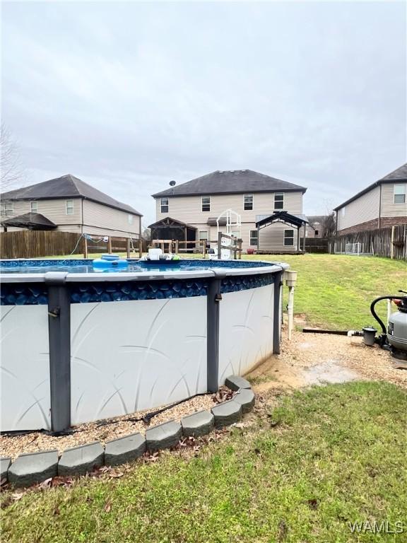 11627 Andrew Way, Tuscaloosa, AL 35405 - pool featuring fence and a lawn
