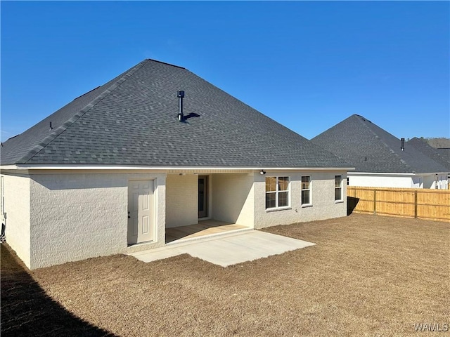 rear view of property with a patio area