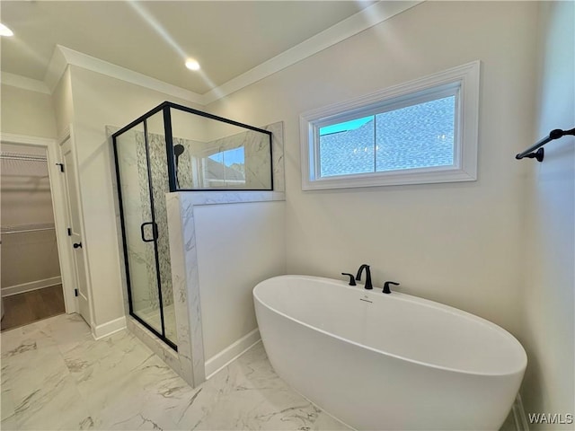 bathroom with crown molding and independent shower and bath