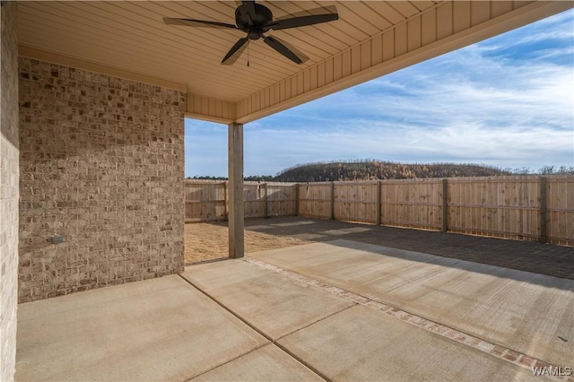 view of patio / terrace with a ceiling fan and a fenced backyard