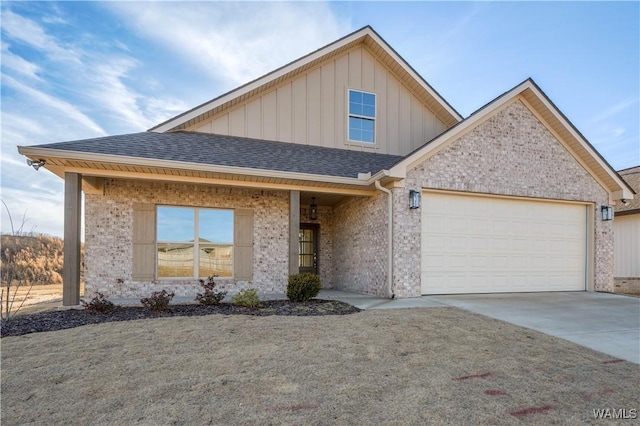 view of front of house with brick siding, roof with shingles, concrete driveway, and an attached garage