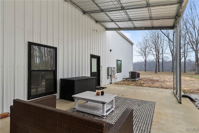 view of patio featuring outdoor lounge area and cooling unit