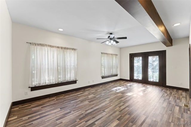 interior space featuring beamed ceiling, dark hardwood / wood-style floors, ceiling fan, and french doors