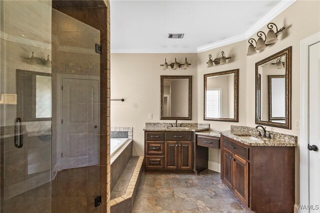 full bathroom featuring two vanities, a stall shower, crown molding, visible vents, and a garden tub