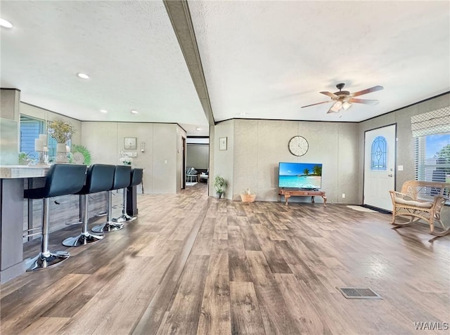 234 Broad Leaf Cir, Moundville, AL 35474 - living area featuring wood finished floors, a ceiling fan, and recessed lighting