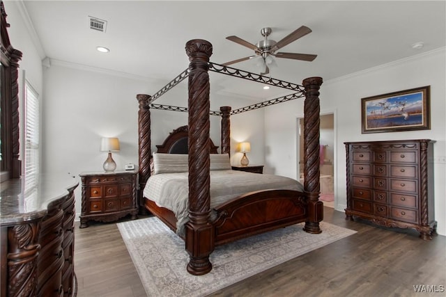 bedroom with hardwood / wood-style flooring, ceiling fan, and ornamental molding