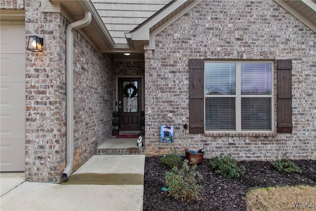 entrance to property with a garage