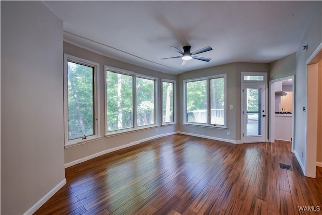 interior space with visible vents and ceiling fan