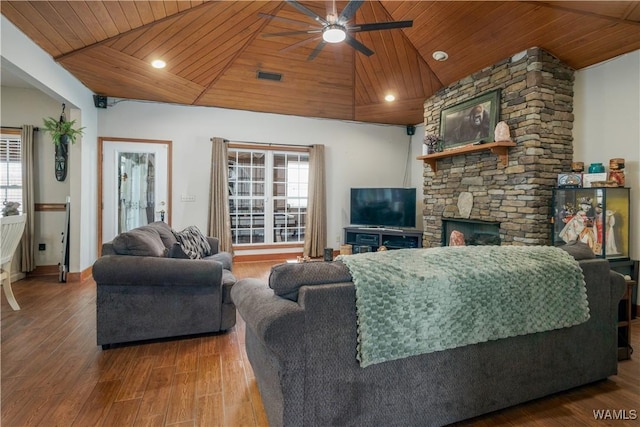 living room featuring ceiling fan, plenty of natural light, wooden ceiling, and wood-type flooring