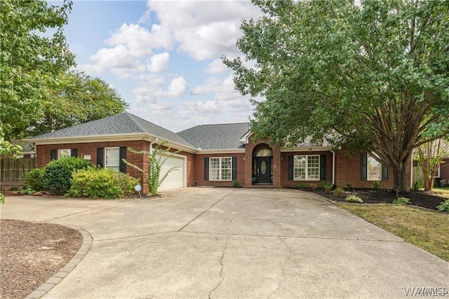 ranch-style house featuring a garage