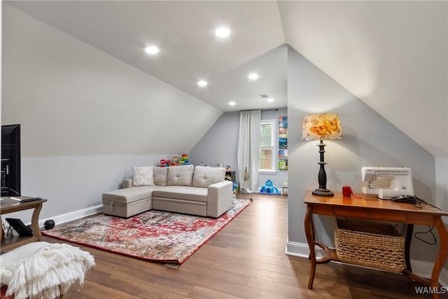 1416 30th Ave E, Tuscaloosa, AL 35404 - living room with vaulted ceiling, wood finished floors, baseboards, a desk, and recessed lighting