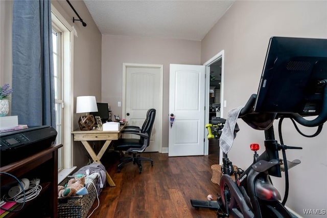 office space with wood finished floors