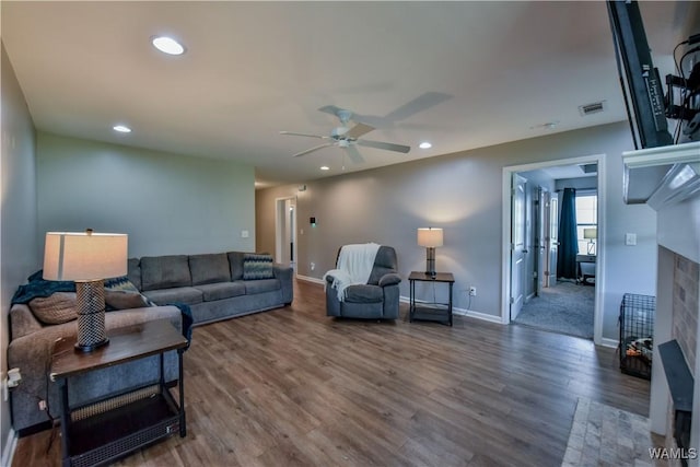 13024 Brookview Way, Northport, AL 35473 - living room featuring baseboards, a ceiling fan, a premium fireplace, and visible vents