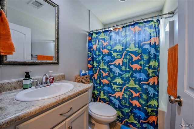 13024 Brookview Way, Northport, AL 35473 - bathroom featuring vanity, a shower with shower curtain, visible vents, and toilet