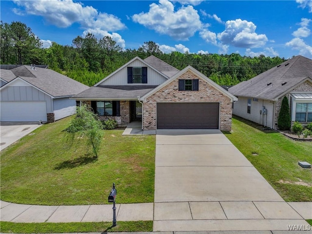 13024 Brookview Way, Northport, AL 35473 - craftsman-style house with brick siding, a garage, a front yard, and concrete driveway