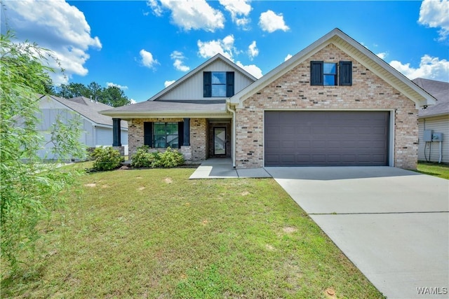 13024 Brookview Way, Northport, AL 35473 - view of front of home featuring a garage, concrete driveway, a front yard, and brick siding