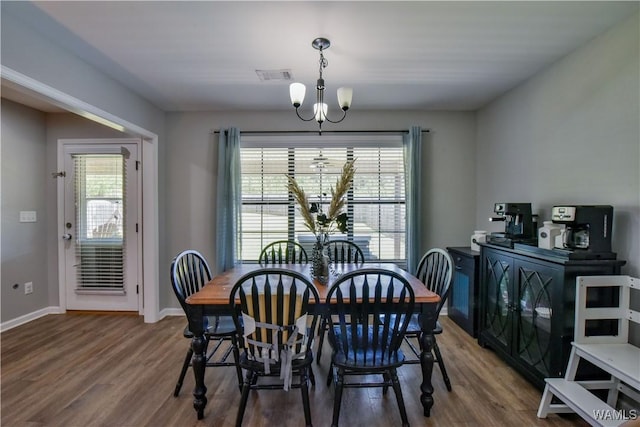 13024 Brookview Way, Northport, AL 35473 - dining room featuring visible vents, wood finished floors, a notable chandelier, and a wealth of natural light