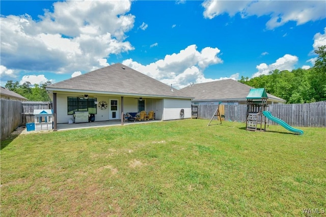 13024 Brookview Way, Northport, AL 35473 - rear view of house with a patio, a ceiling fan, a playground, and a fenced backyard
