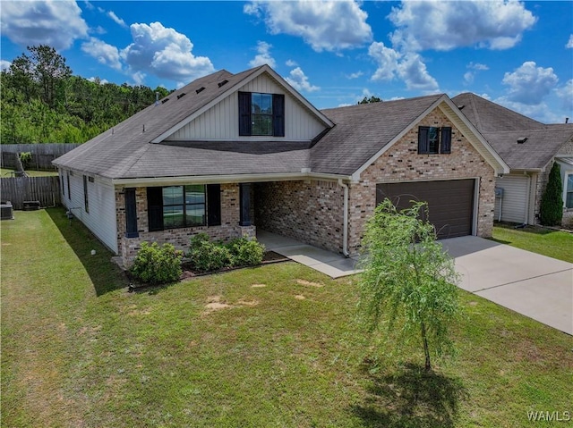 13024 Brookview Way, Northport, AL 35473 - view of front facade with fence, an attached garage, concrete driveway, and brick siding