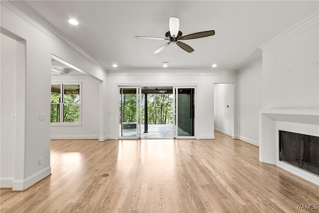 13952 Watercolor Pointe, Northport, AL 35475 - unfurnished living room featuring a fireplace, baseboards, ceiling fan, and ornamental molding