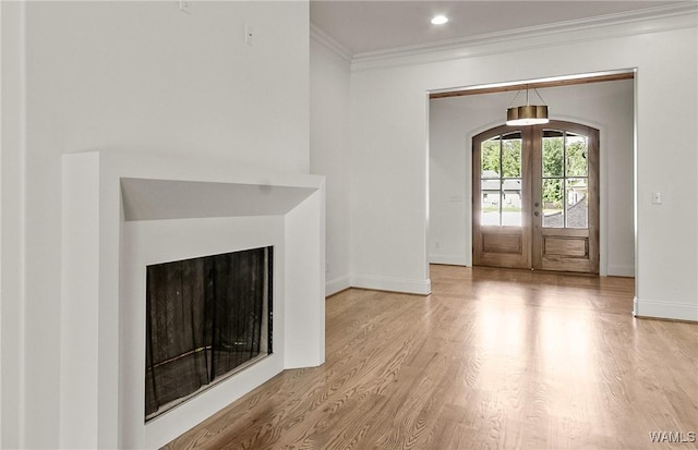 13952 Watercolor Pointe, Northport, AL 35475 - unfurnished living room with crown molding, baseboards, visible vents, and wood finished floors