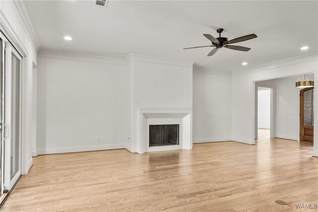 13952 Watercolor Pointe, Northport, AL 35475 - unfurnished living room featuring crown molding, recessed lighting, a ceiling fan, and light wood finished floors