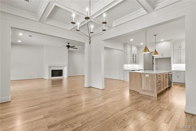 13952 Watercolor Pointe, Northport, AL 35475 - unfurnished living room with crown molding, wood finished floors, beam ceiling, coffered ceiling, and ceiling fan with notable chandelier