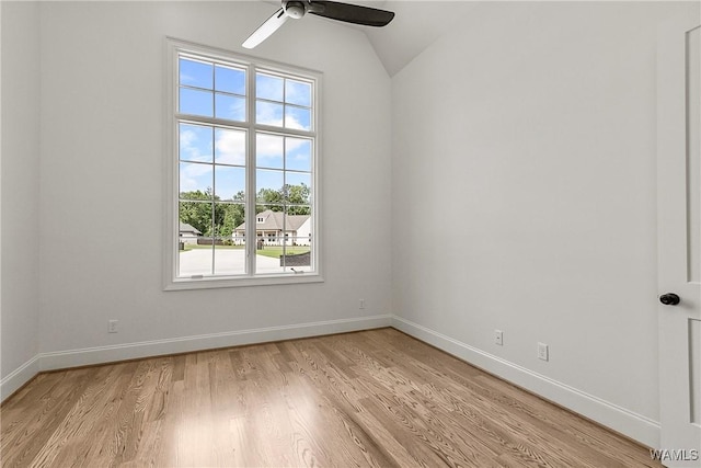 13952 Watercolor Pointe, Northport, AL 35475 - spare room with light wood-style floors, a ceiling fan, baseboards, and vaulted ceiling