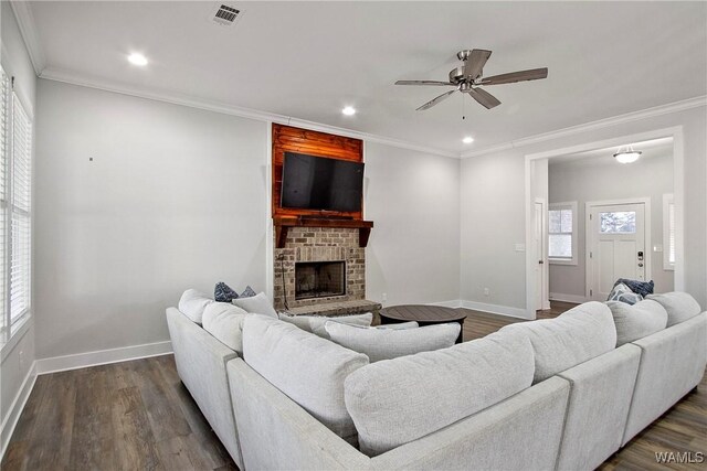 11480 Saint Joseph St, Northport, AL 35475 - living area with a ceiling fan, baseboards, dark wood-style floors, recessed lighting, and ornamental molding