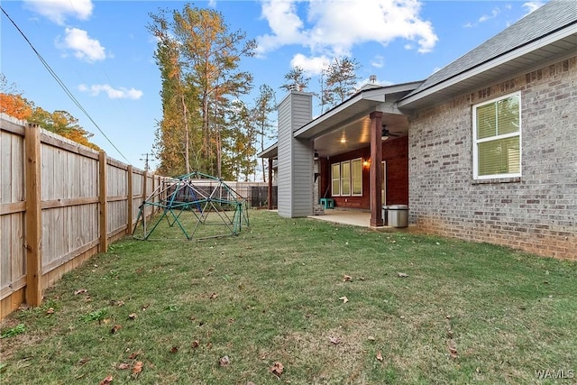 11480 Saint Joseph St, Northport, AL 35475 - view of yard with ceiling fan and a patio