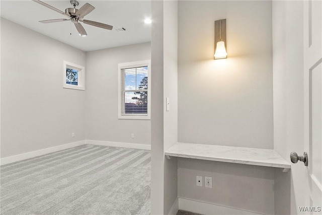 11480 Saint Joseph St, Northport, AL 35475 - carpeted spare room with baseboards, ceiling fan, and an office area