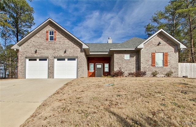 ranch-style home with fence, a shingled roof, a chimney, concrete driveway, and brick siding