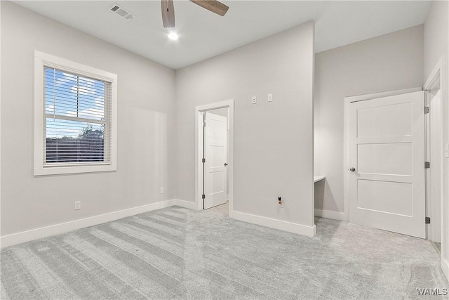 11480 Saint Joseph St, Northport, AL 35475 - unfurnished bedroom with carpet floors, baseboards, and a ceiling fan
